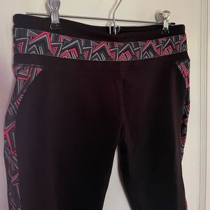 Fabletics black and pink workout leggings.
